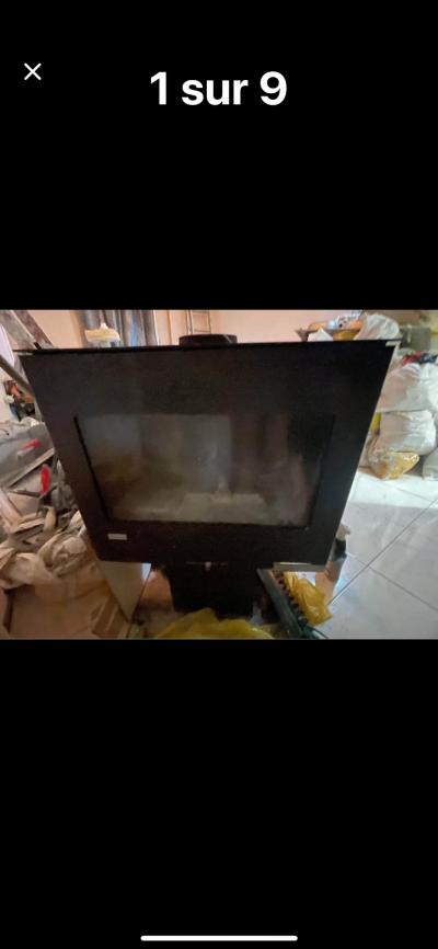 po�le � bois en fonte tr�s lourd pour des buches de 50 cm