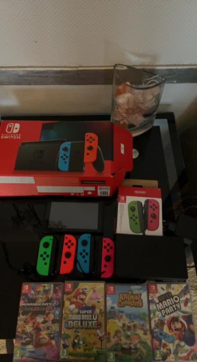 Nintendo Switch   4 jeux (Animal crossing   3 jeux mario) 2 Paires de Joycon