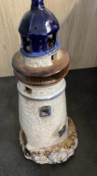 Glazed Ceramic Tea Light Holder in the Shape of a Lighthouse.