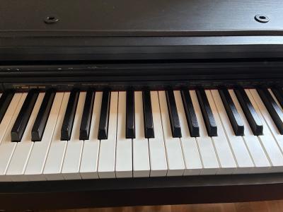 Piano num�rique Casio Celviano en tr�s bon �tat avec facture