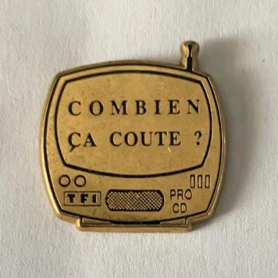 12  �Pin's MEDIA TV TF1 EMISSION COMBIEN CA COUTE   ARTHUS BERTRAND