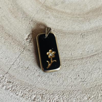 Pendentif fleur �mail noir et dor�
