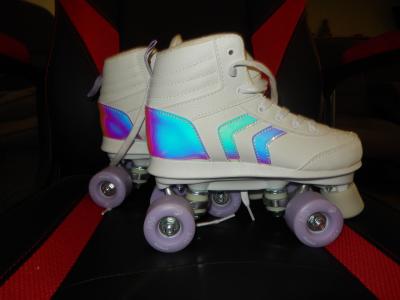 Rollers ou patin a roulettes marque Oxelo  de couleur blanc taille 38 �tat neuf.