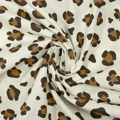 Tissu popeline de coton l�opard blanc marron 1 m�tre