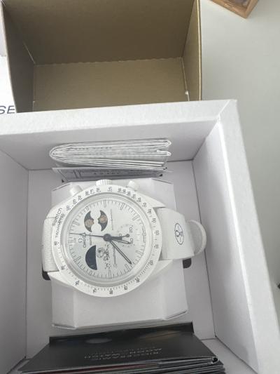 montre swatch omega Snoopy