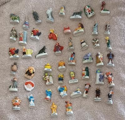 lot de 50 f�ves n�8 Schtroumpfs Shrek Disney Looney Tunes Minions Donald Asterix