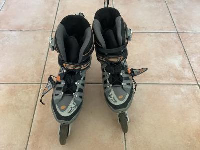 Rollerblade Crossfire rollers en ligne gris-noir-orange   protections 42 EU