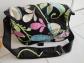 SAC BANDOULIERE POUR  CHANGER  BEBE marque COSMOPOLITAIN NOIR  MOTIF FLEURS