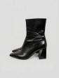 Bottines noires en cuir   Aeyde