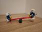 Lot de 2 Figurines Schtroumpfs sur Balan�oire Tape Cul,Schleich Peyo