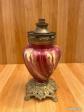 Ancienne lampe   fa�ence �maill�e rouge, pied en laiton d�cor�