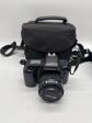Appareil photo argentique Nikon F70 objectif AF Nikkor 35 70mm sacoche
