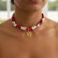 Collier en tissu avec pendentif en acier inoxydable