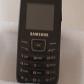 T�l�phone Mobile Noir Samsung Avec Sont Chargeur Samsung.