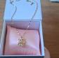 Collier avec pendentif chat m�tal dor� pierre cristal strass 46 50 cm
