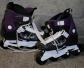 Rollers en ligne noir blanc violet  Taille 39 ,tr�s peu servi.