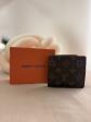 Louis Vuitton Portefeuille monogramme marron porte cartes ID